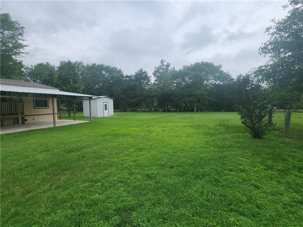 3738 Smetana Road Bryan, TX 77807 - Photo 27 of 29 a view of a house with a big yard
