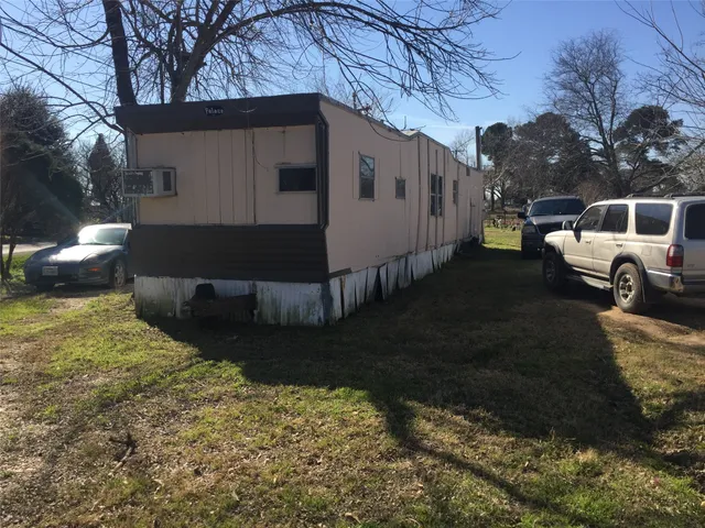 a house view with a backyard space