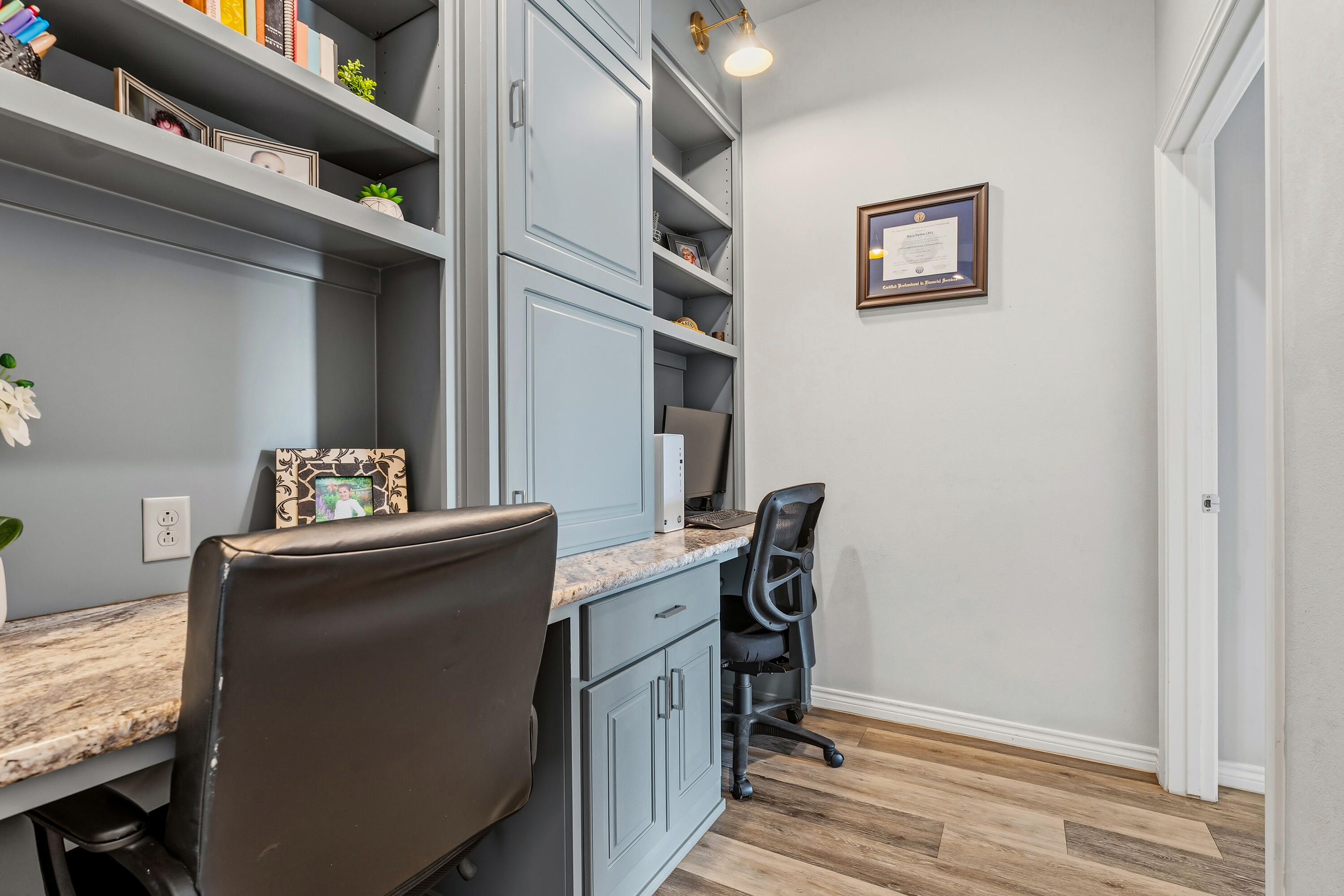 3611 133rd Street Lubbock, TX 79423 - Photo 22 of 31 a workspace with furniture
