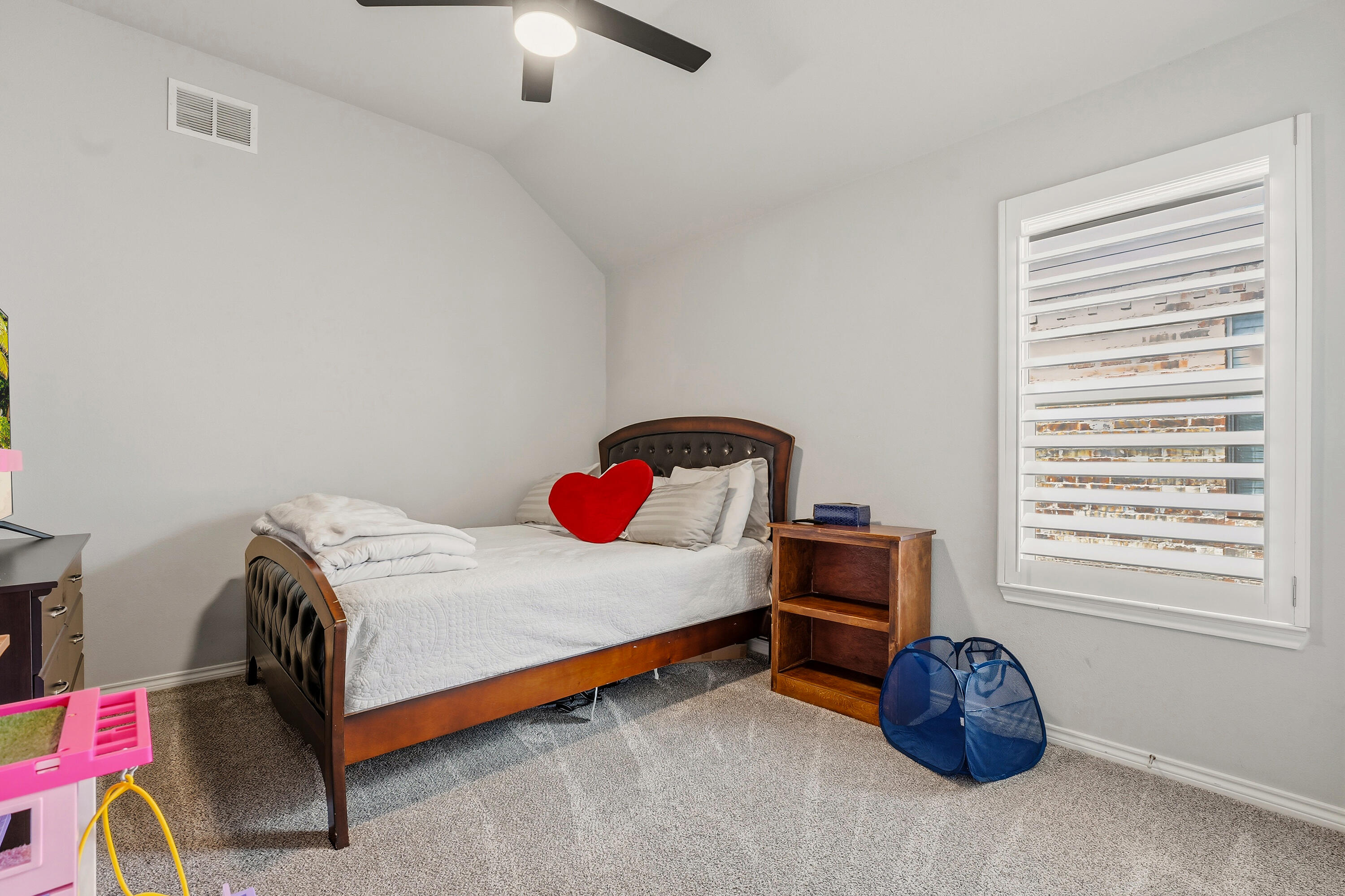 3611 133rd Street Lubbock, TX 79423 - Photo 23 of 31 a bedroom with a bed and a window