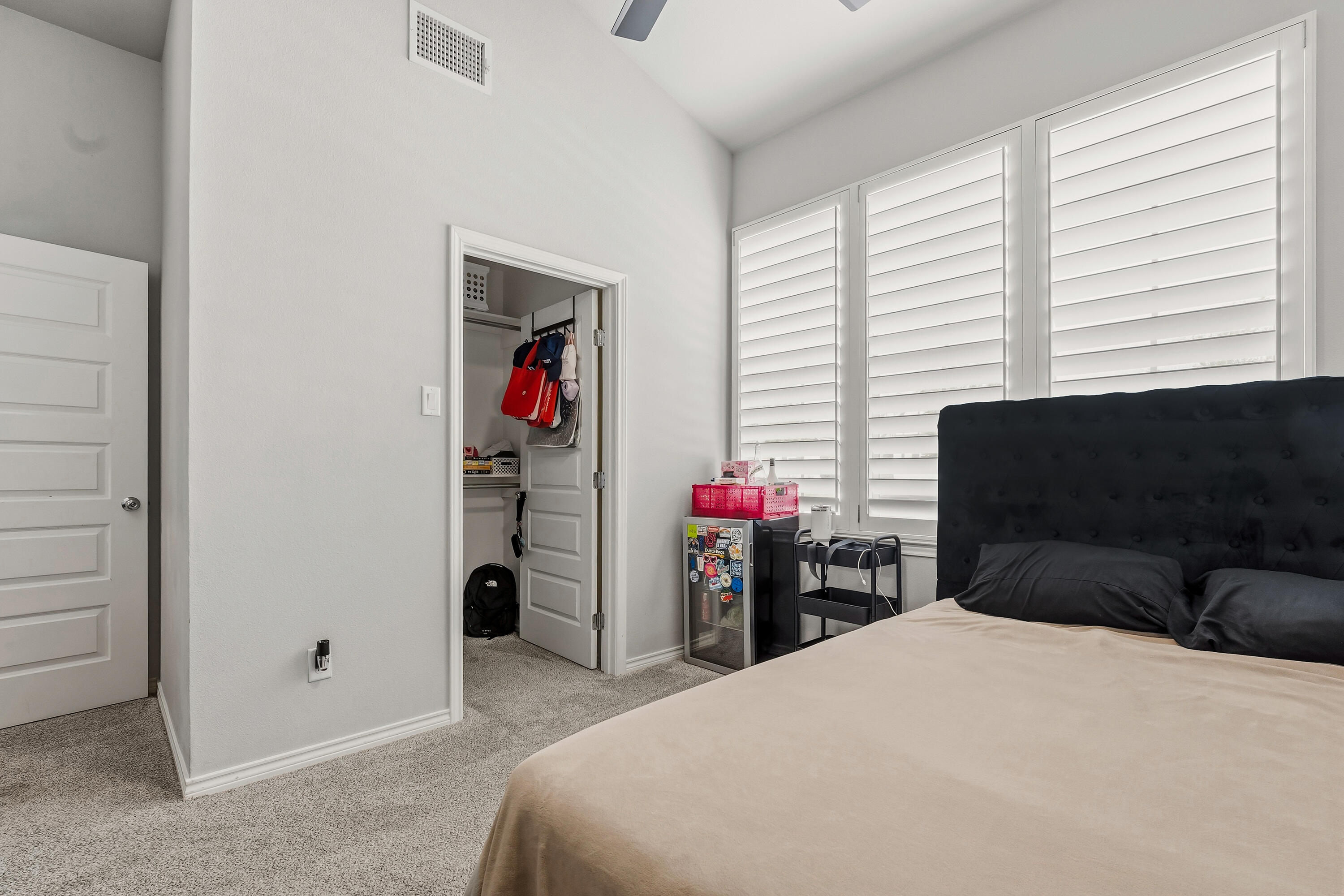 3611 133rd Street Lubbock, TX 79423 - Photo 27 of 31 a bedroom with a bed and a closet