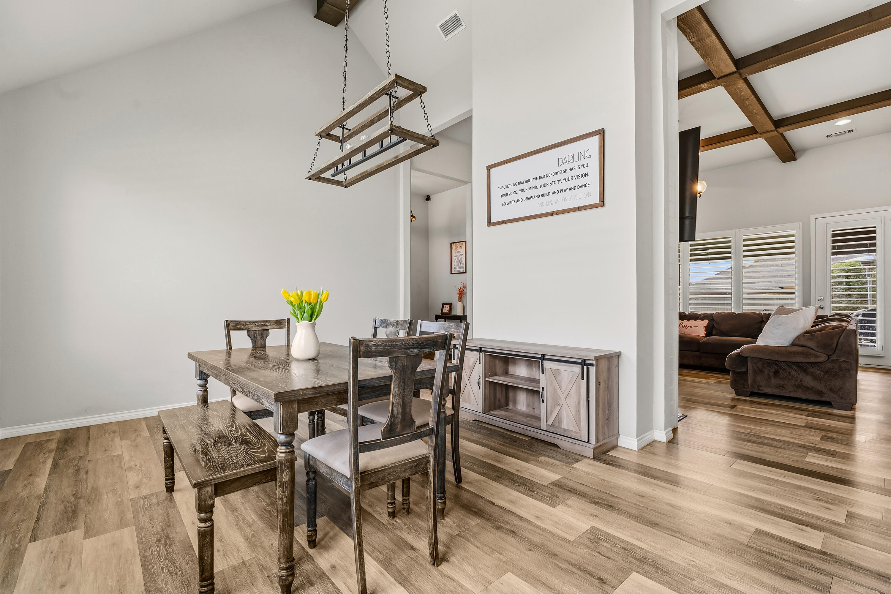 3611 133rd Street Lubbock, TX 79423 - Photo 9 of 31 a view of a dining room with furniture and wooden floor