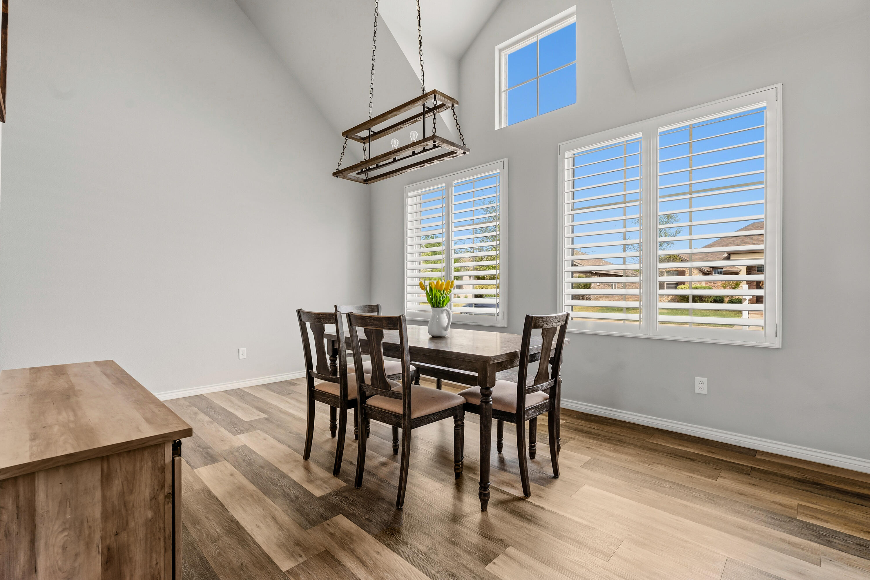 3611 133rd Street Lubbock, TX 79423 - Photo 10 of 31 a view of a dining room with furniture and window