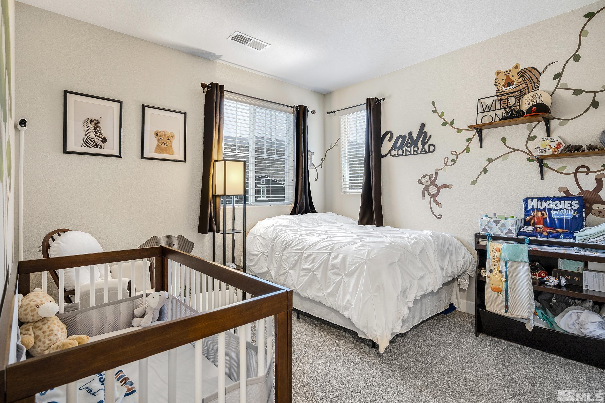 3300 Show Jumper Lane Reno, NV 89521 - Photo 20 of 40 a bedroom with a bed and a window