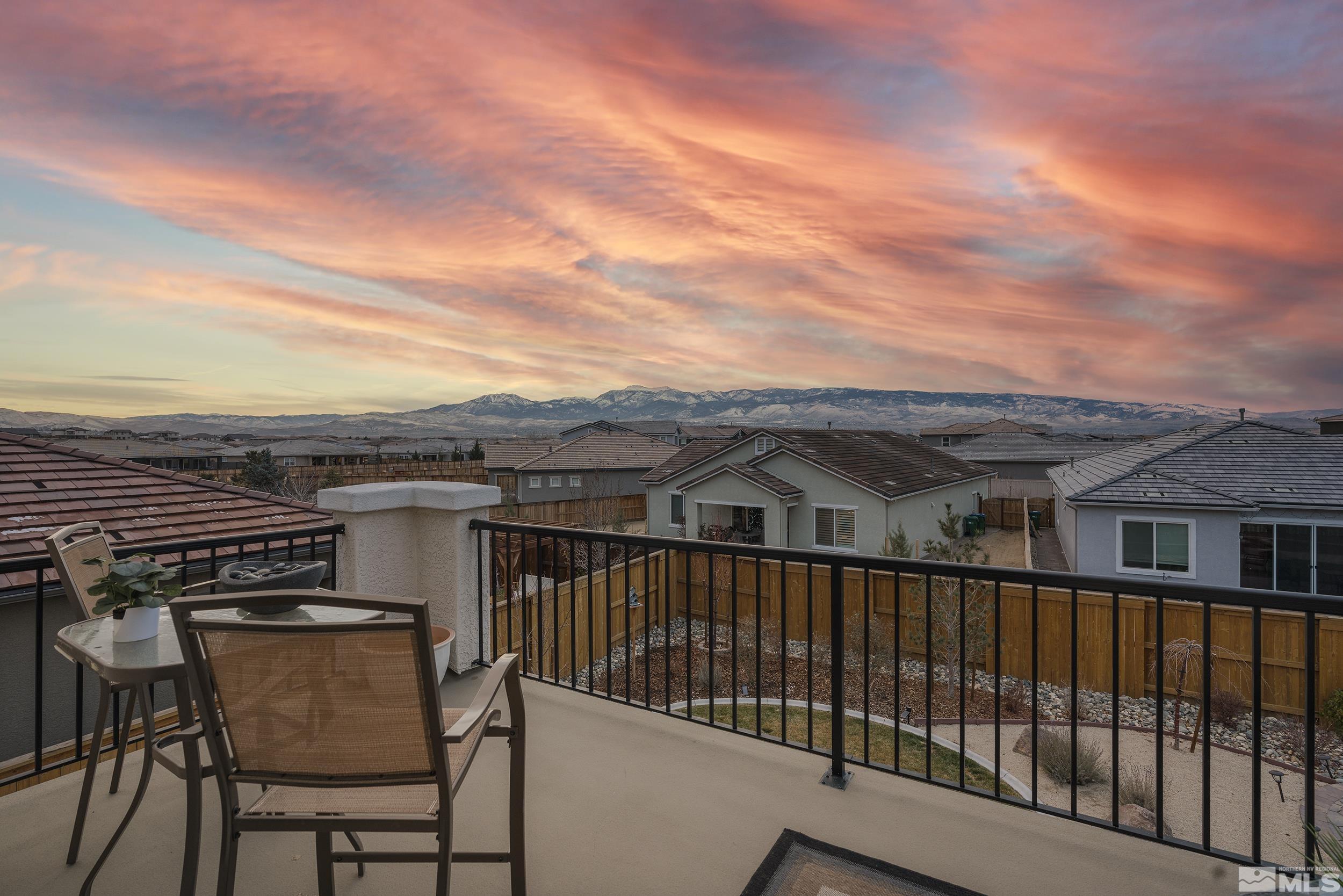 3300 Show Jumper Lane Reno, NV 89521 - Photo 2 of 40 a view of a roof deck with chair and wooden floor
