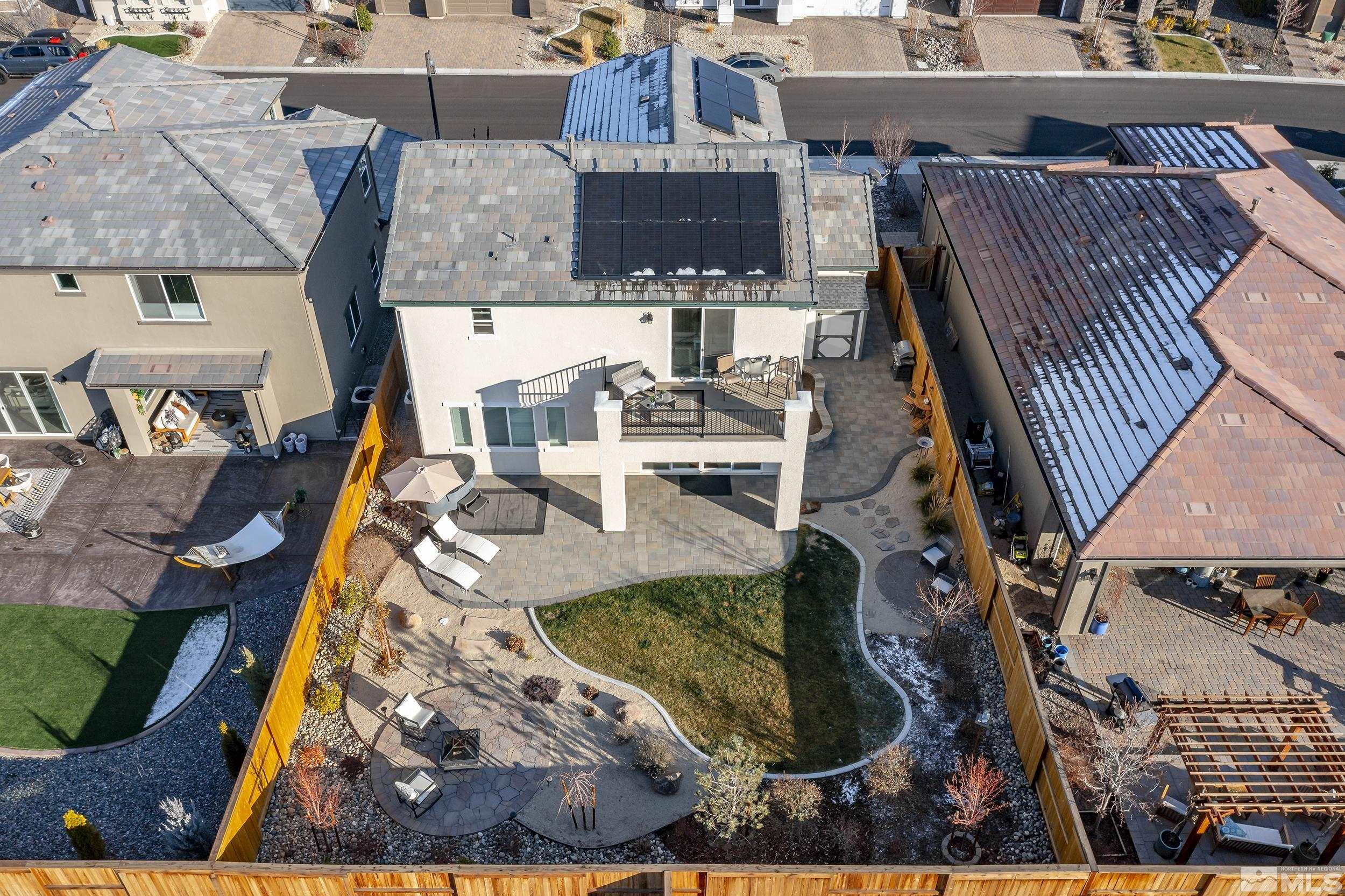 3300 Show Jumper Lane Reno, NV 89521 - Photo 26 of 40 an aerial view of a house with swimming pool and sitting space