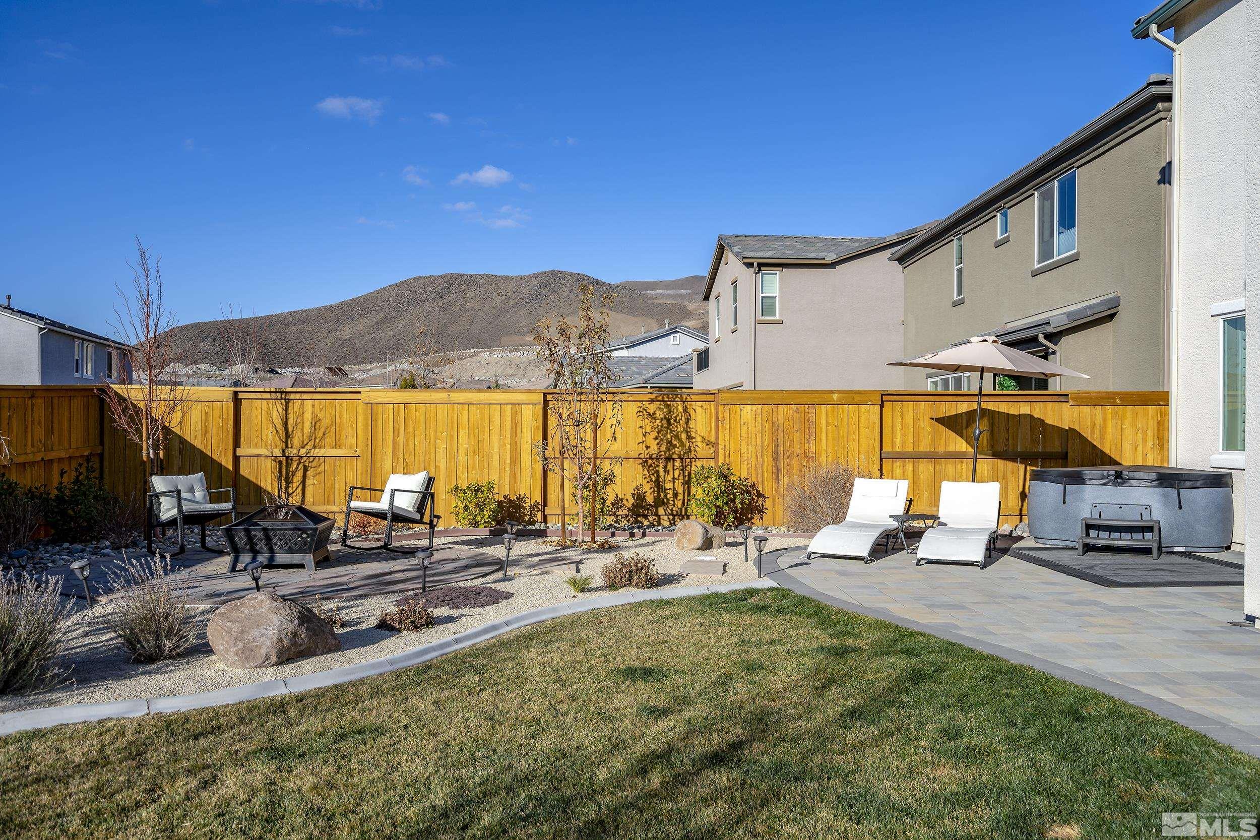 3300 Show Jumper Lane Reno, NV 89521 - Photo 31 of 40 a view of a house with a swimming pool
