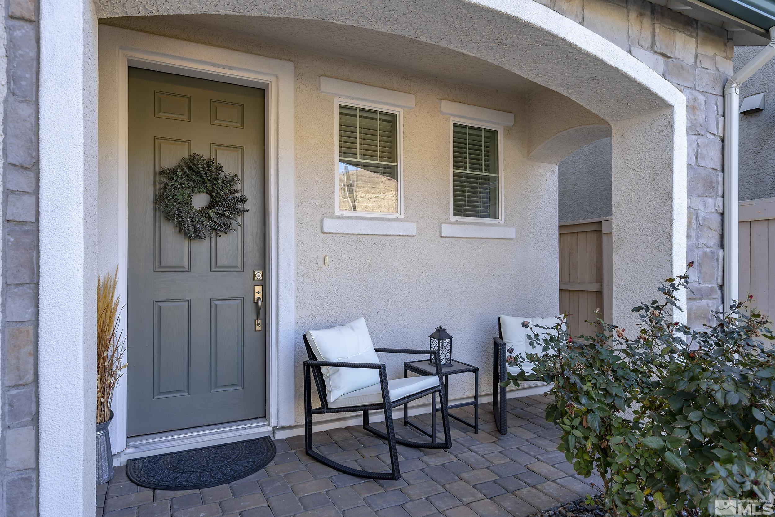 3300 Show Jumper Lane Reno, NV 89521 - Photo 9 of 40 a view of a entryway front of house