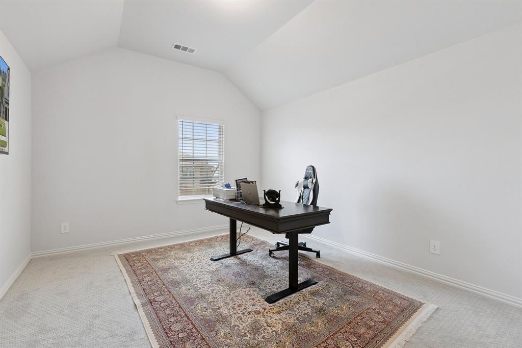 Undisclosed Address Wylie, TX 75098 - Photo 24 of 26 Bedroom featuring lofted ceiling