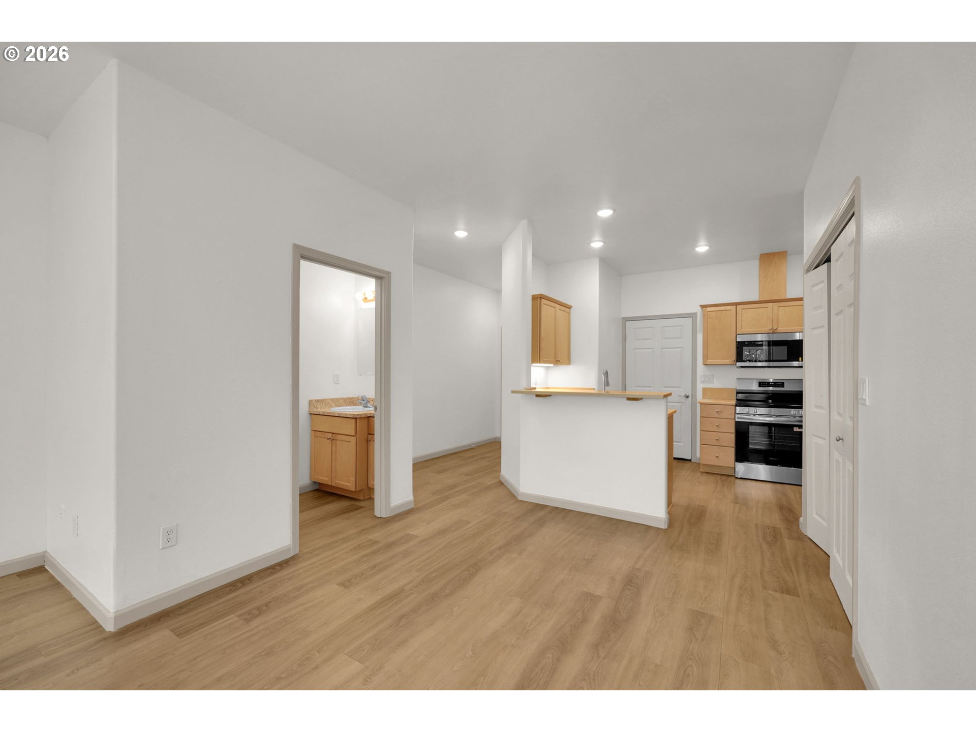 1726 32nd Street Florence, OR 97439 - Photo 8 of 38 a view of kitchen with wooden floor