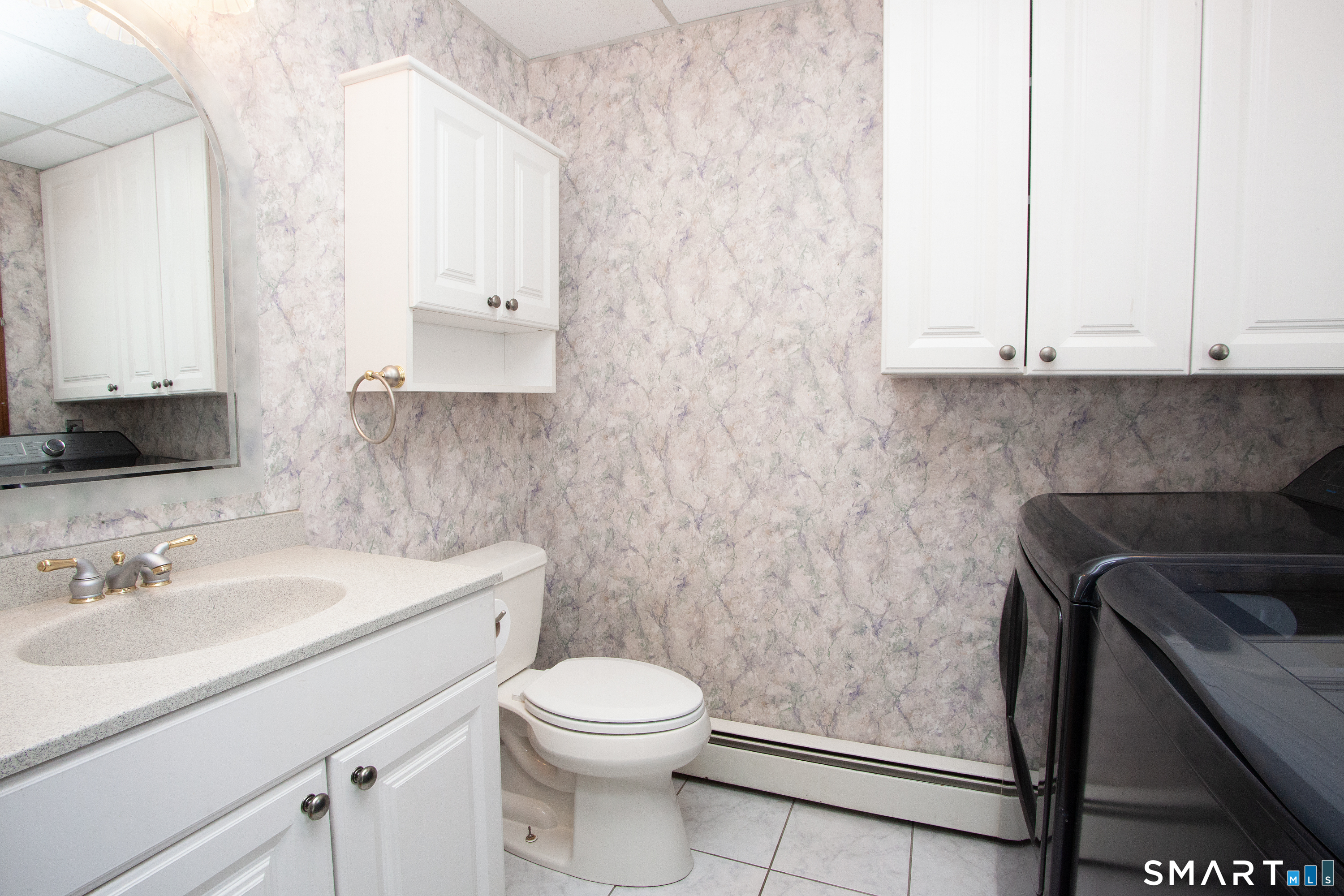 10 Ridgewood Drive Suffield, CT 06093 - Photo 22 of 38 Powder room with laundry hookups