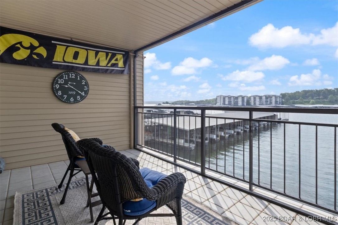 90 Falls Point Drive, Unit 2C Lake Ozark, MO 65049 - Photo 1 of 1 Kick back & relax with a book or cup of coffee as