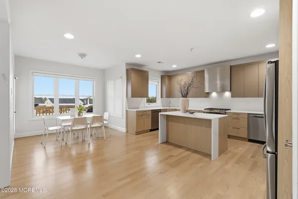 a kitchen with a stove and a microwave
