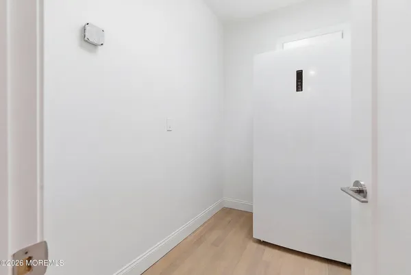 a view of a bathroom with a sink a toilet and a bathtub
