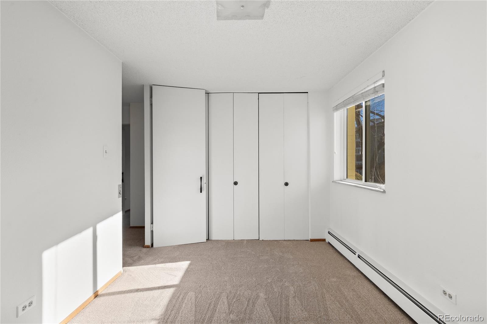 750 South Clinton Street, Unit 2B Denver, CO 80247 - Photo 19 of 43 a view of an empty room
