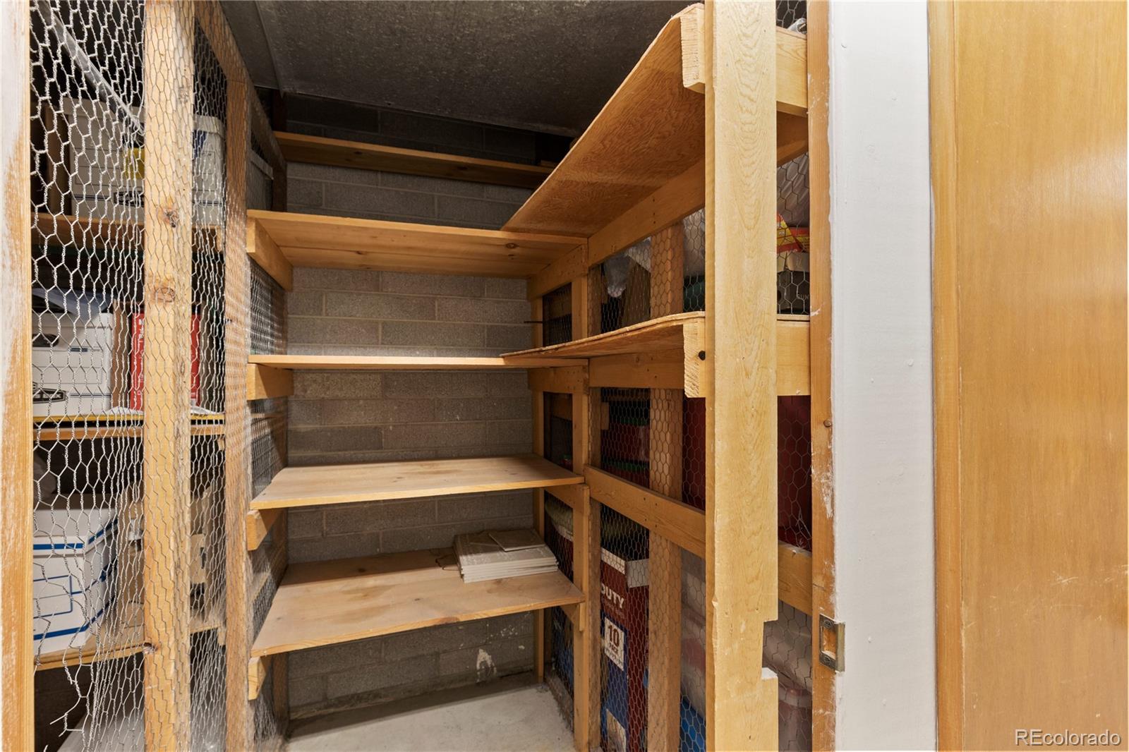 750 South Clinton Street, Unit 2B Denver, CO 80247 - Photo 26 of 43 a view of walk in closet with empty racks