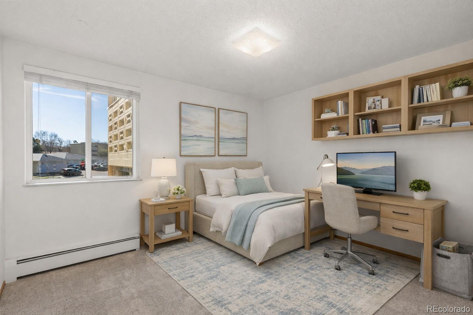 750 South Clinton Street, Unit 2B Denver, CO 80247 - Photo 5 of 43 a room with a bed and a window