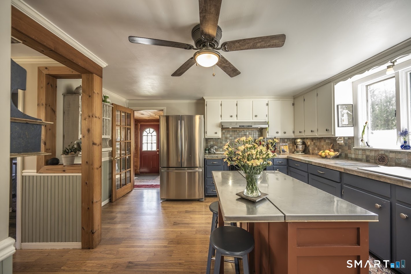 53 Cedar Street Middlefield, CT 06481 - Photo 11 of 30 Spacious country kitchen with center island and warm, inviting layout.