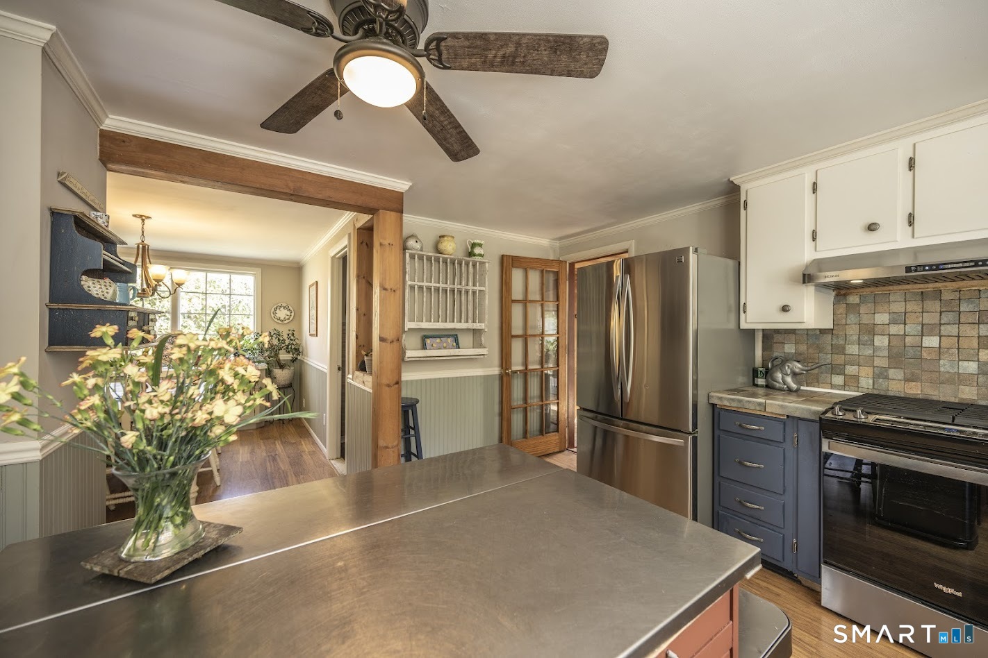 53 Cedar Street Middlefield, CT 06481 - Photo 12 of 30 Seamless flow from kitchen to dining area-perfect for everyday living and entertaining.