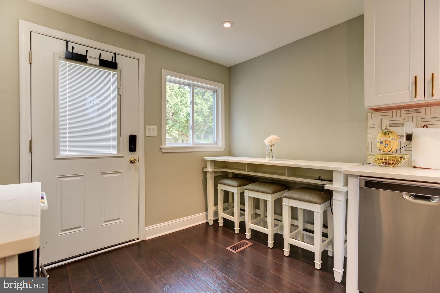 7310 Torran Rocks Way Gaithersburg, MD 20879 - Photo 11 of 32 a open kitchen with a sink cabinets and wooden floor