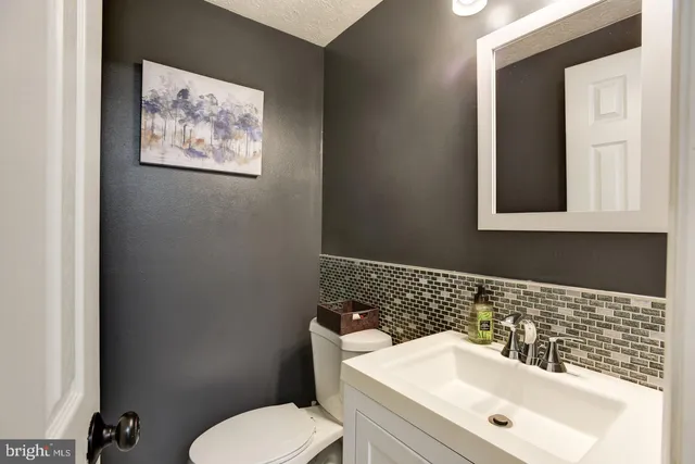 a bathroom with a sink and a toilet