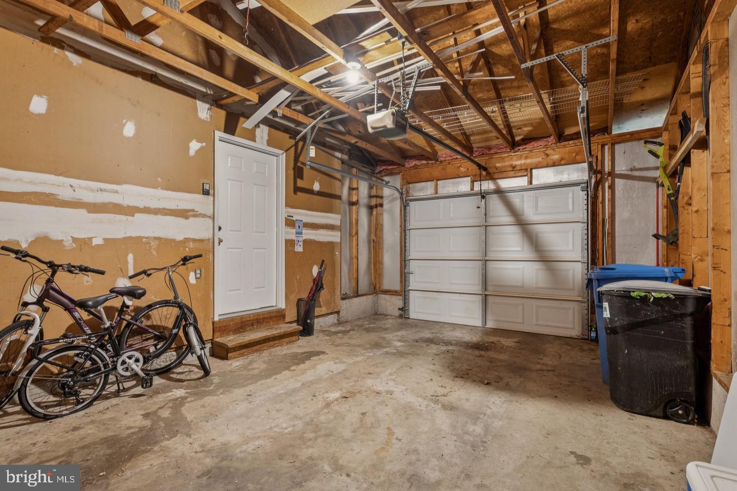 7310 Torran Rocks Way Gaithersburg, MD 20879 - Photo 23 of 32 a view of a garage with furniture