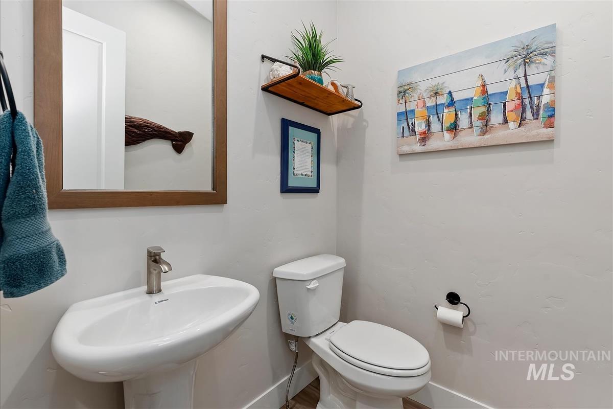 3413 North Hosta Avenue Star, ID 83669 - Photo 12 of 50 Bathroom featuring toilet and baseboards
