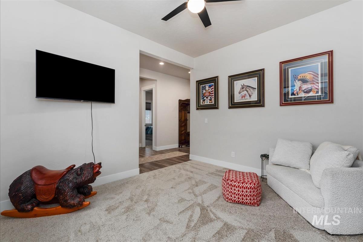3413 North Hosta Avenue Star, ID 83669 - Photo 25 of 50 Sitting room featuring light carpet and a ceiling fan