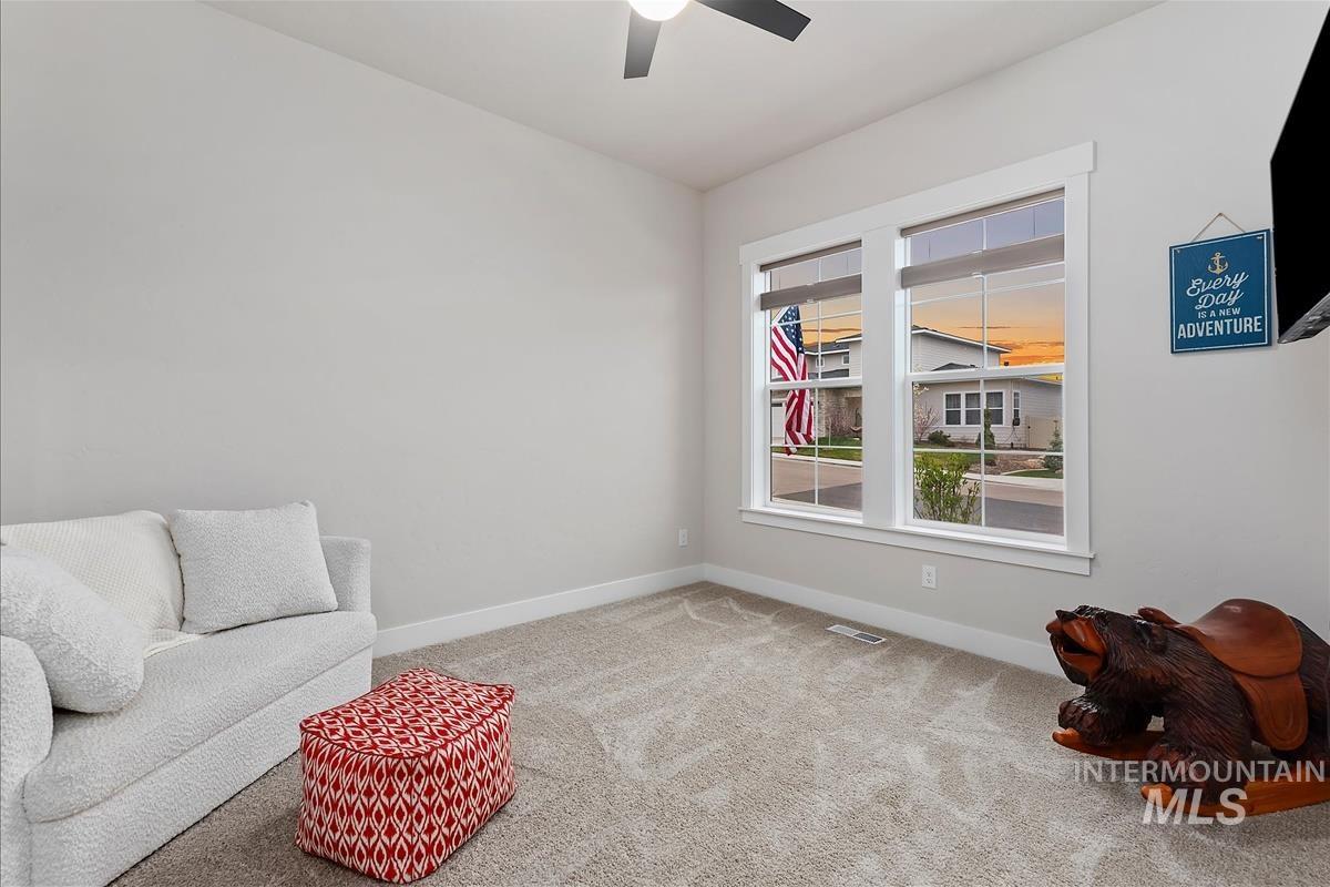 3413 North Hosta Avenue Star, ID 83669 - Photo 26 of 50 Unfurnished room with light carpet and a ceiling fan