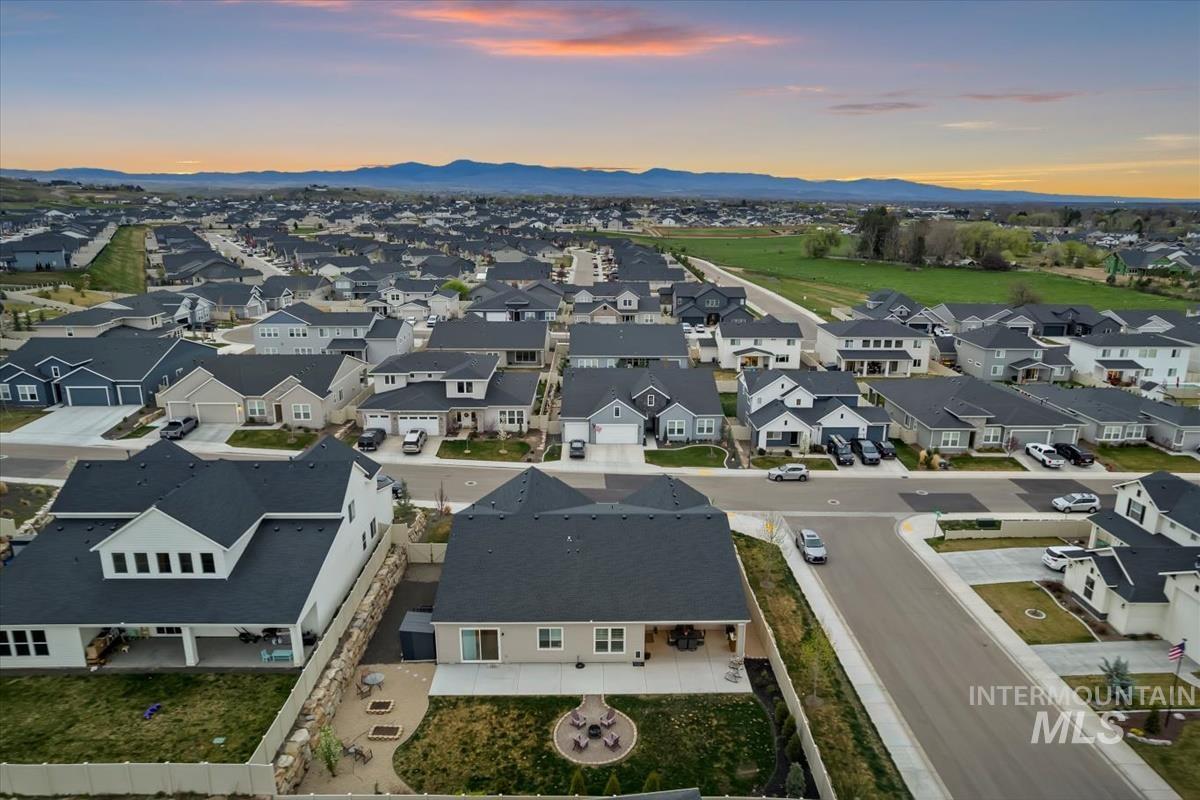 3413 North Hosta Avenue Star, ID 83669 - Photo 41 of 50 Aerial view at dusk of a mountain view and a residential view