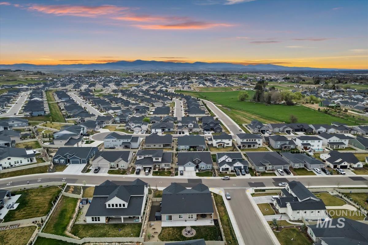 3413 North Hosta Avenue Star, ID 83669 - Photo 45 of 50 Aerial view at dusk of a residential view and a mountain view