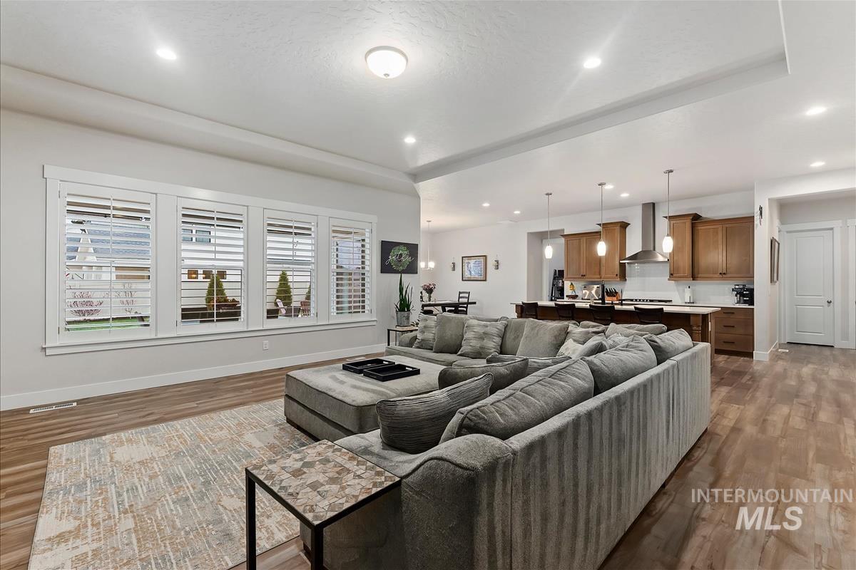 3413 North Hosta Avenue Star, ID 83669 - Photo 5 of 50 Living area featuring wood finished floors and recessed lighting