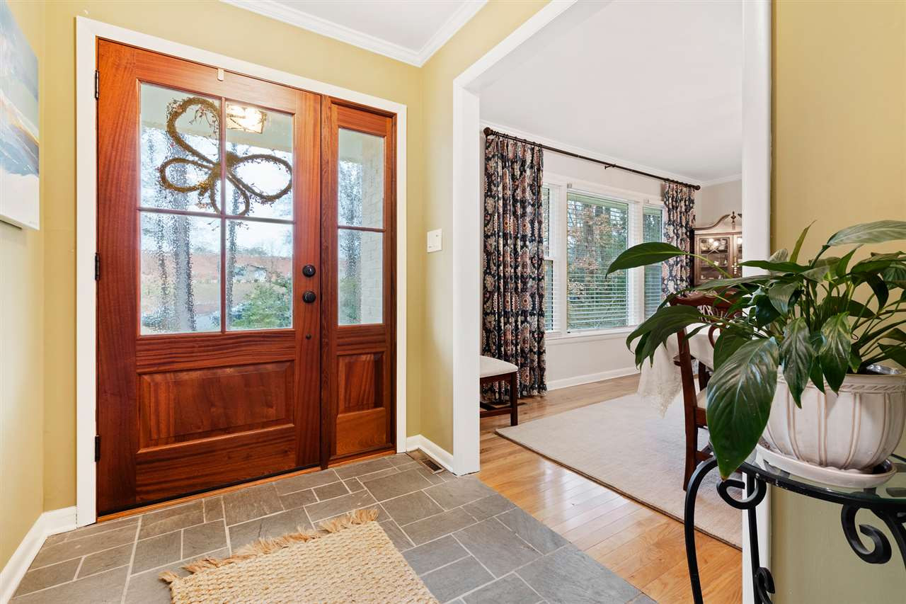 3325 Horton Street Raleigh, NC 27607 - Photo 9 of 30 One is greeted at the foyer which is layed in slate. To one's left is the DR layed in hardwoods