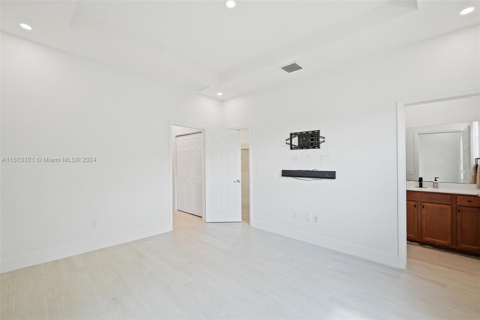 9361 West 33rd Way Hialeah, FL 33018 - Photo 17 of 30 a view of an empty room