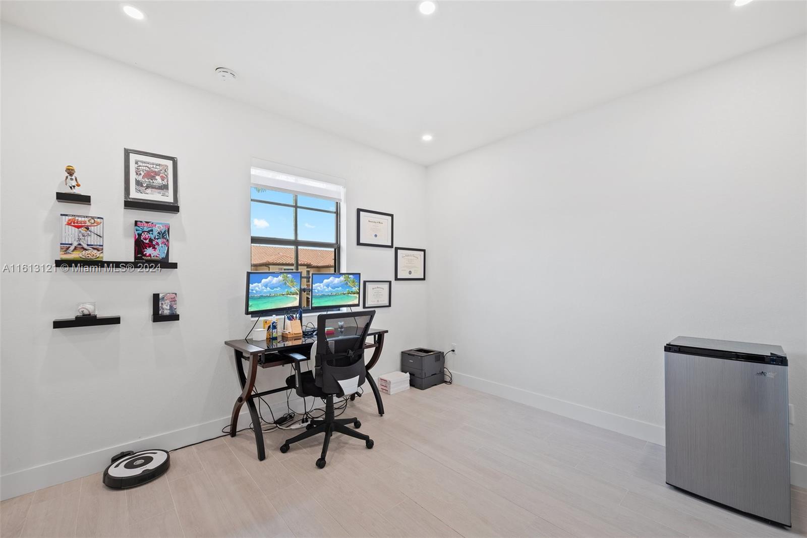 9361 West 33rd Way Hialeah, FL 33018 - Photo 20 of 30 a workspace with furniture and window