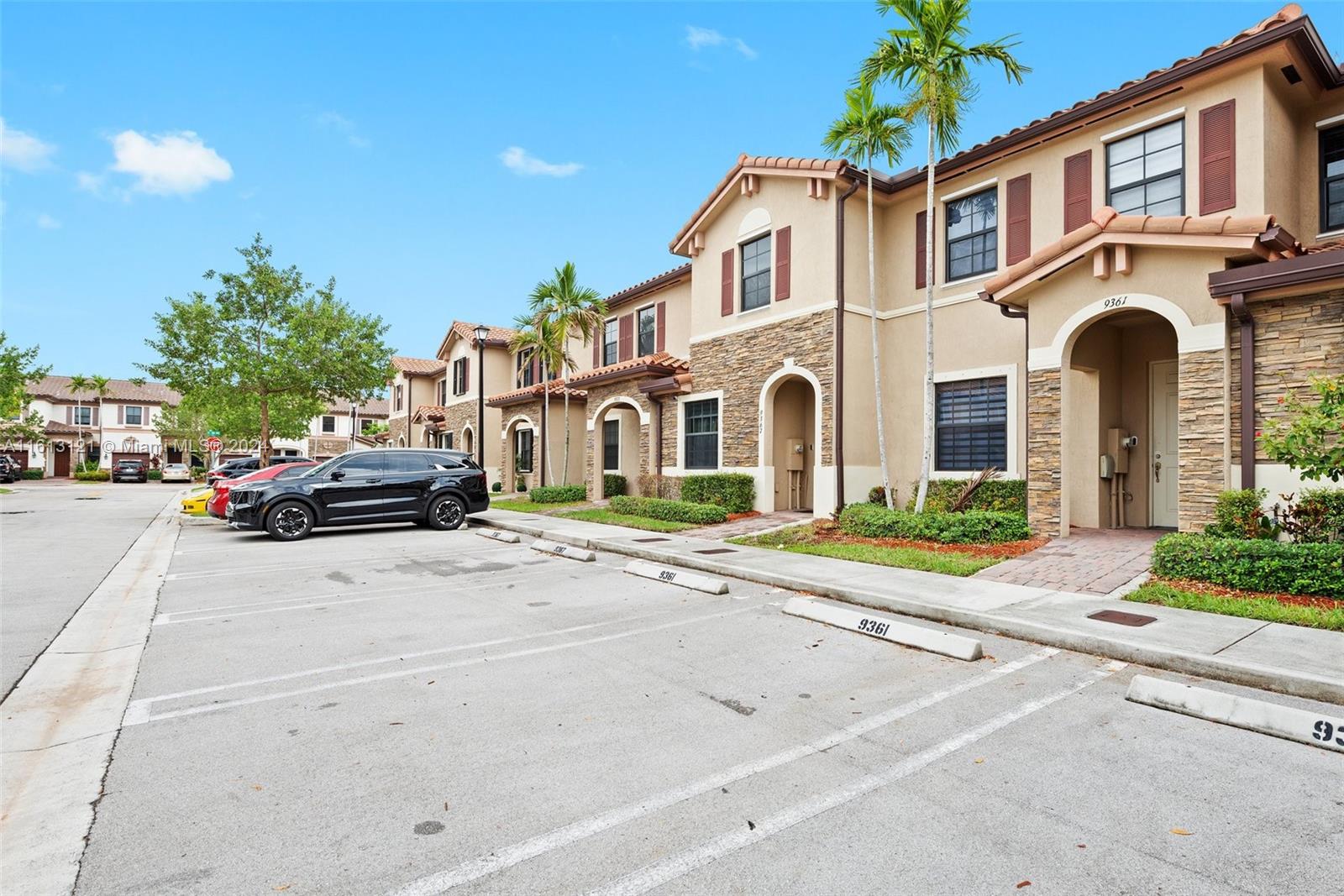 9361 West 33rd Way Hialeah, FL 33018 - Photo 2 of 30 a view of multiple houses with a yard