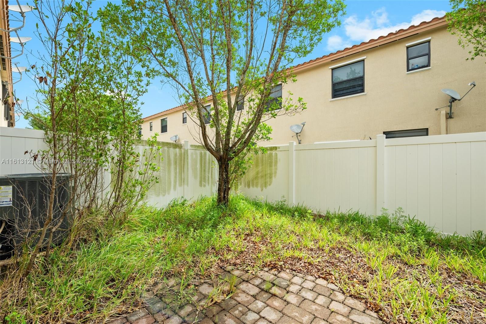 9361 West 33rd Way Hialeah, FL 33018 - Photo 24 of 30 a view of a backyard of the house