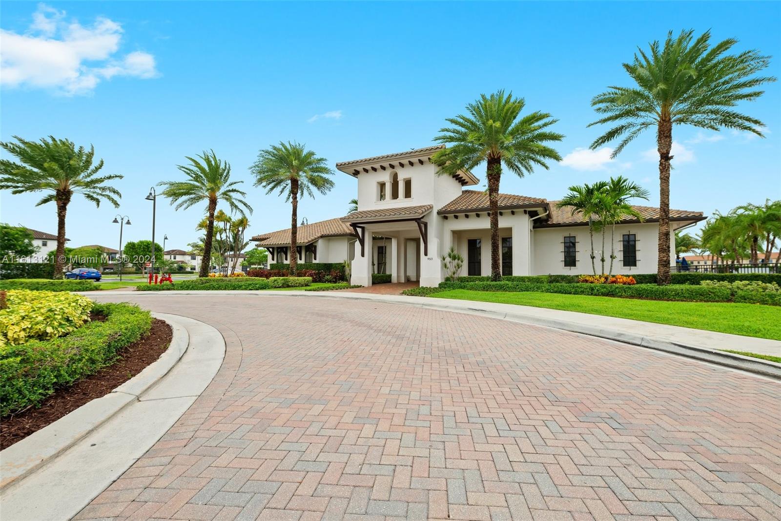 9361 West 33rd Way Hialeah, FL 33018 - Photo 26 of 30 a front view of multiple houses with yard