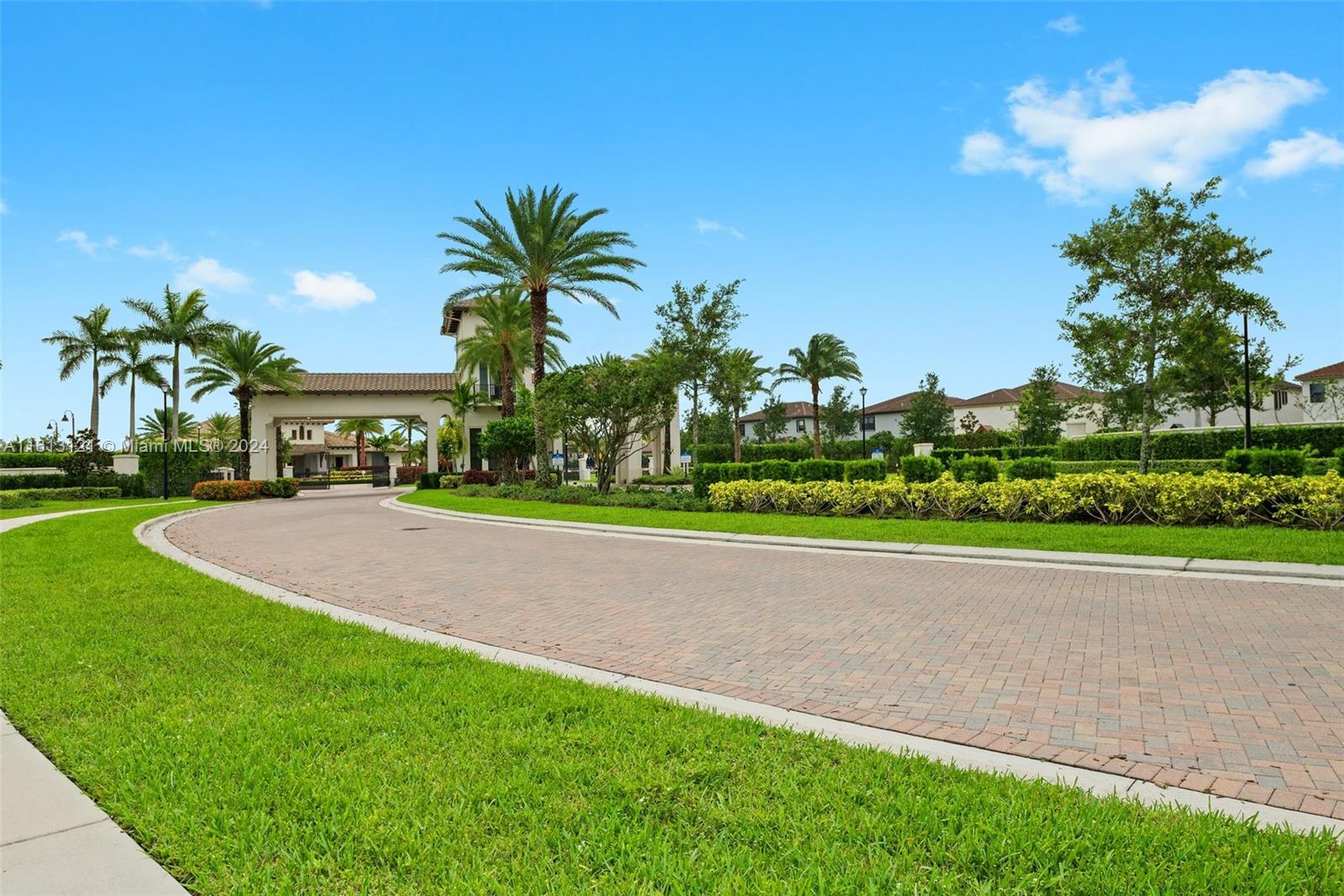 9361 West 33rd Way Hialeah, FL 33018 - Photo 30 of 30 a palm tree sitting in front of a house with a big yard