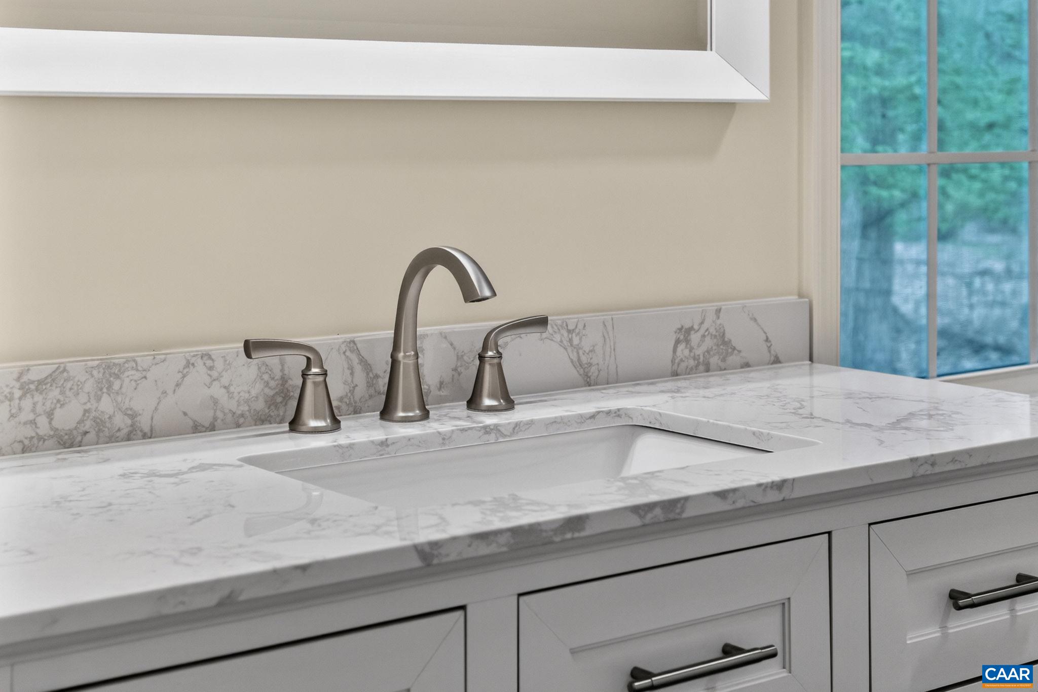 673 Cedar Lane Road Palmyra, VA 22963 - Photo 26 of 47 a close view of sink and tap