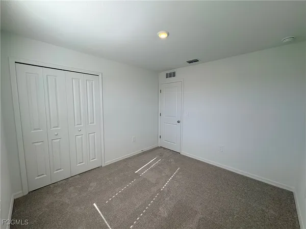 an empty room with a natural light