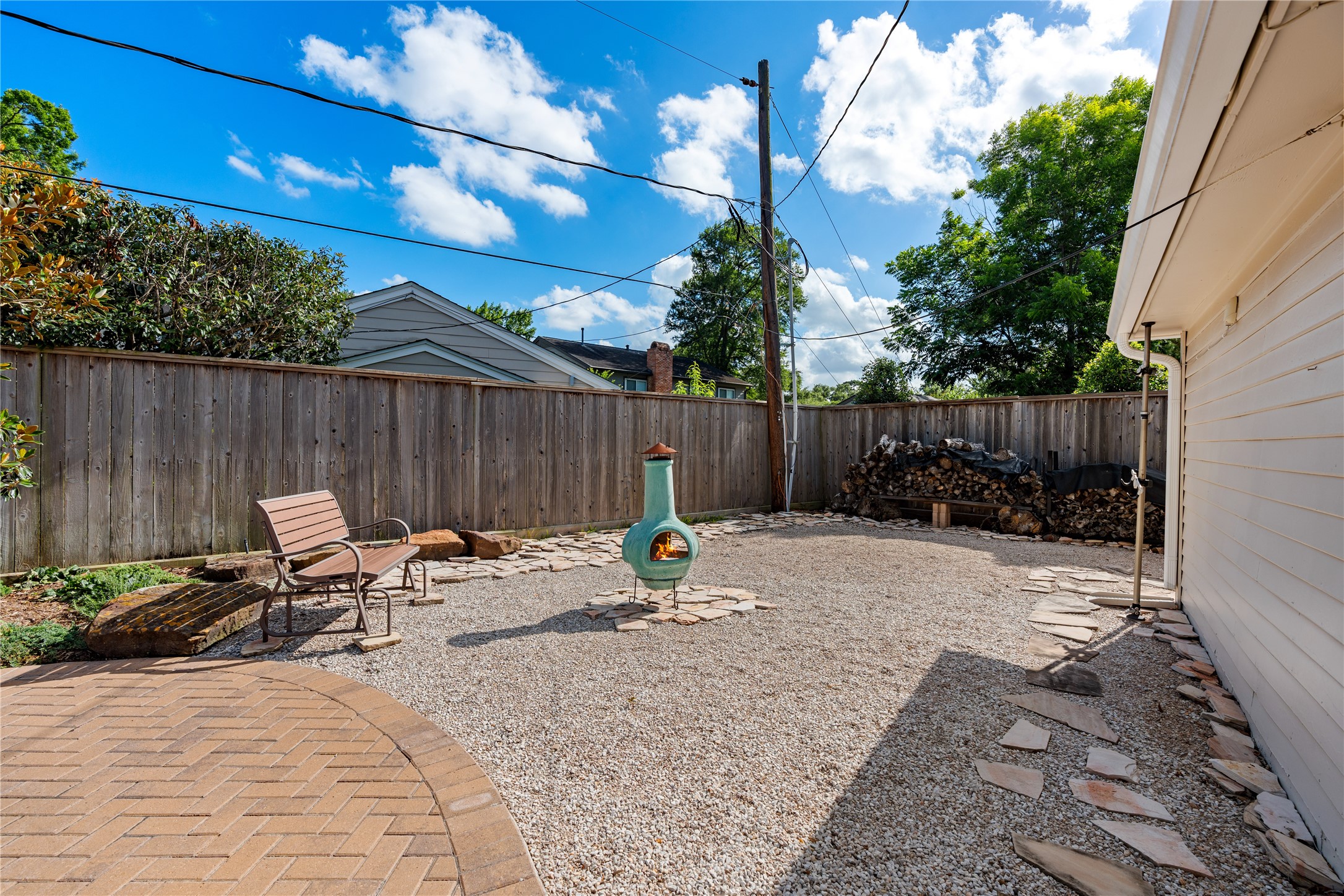 14219 Apple Tree Road Houston, TX 77079 - Photo 27 of 33 Large area behind the garage. Could be easily turfed for pets or play area.