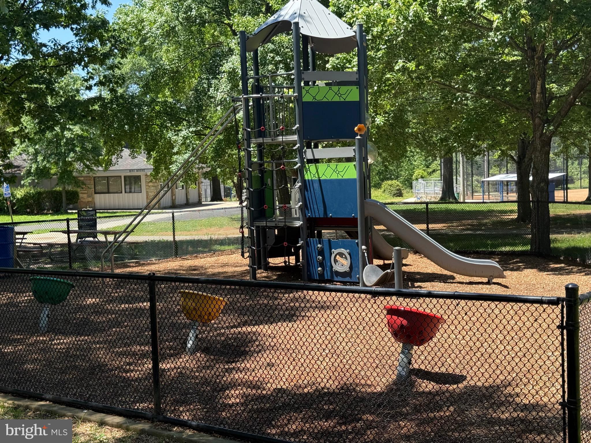 5608 Heming Avenue Springfield, VA 22151 - Photo 20 of 26 a house view with a sitting space fire pit and outdoor space