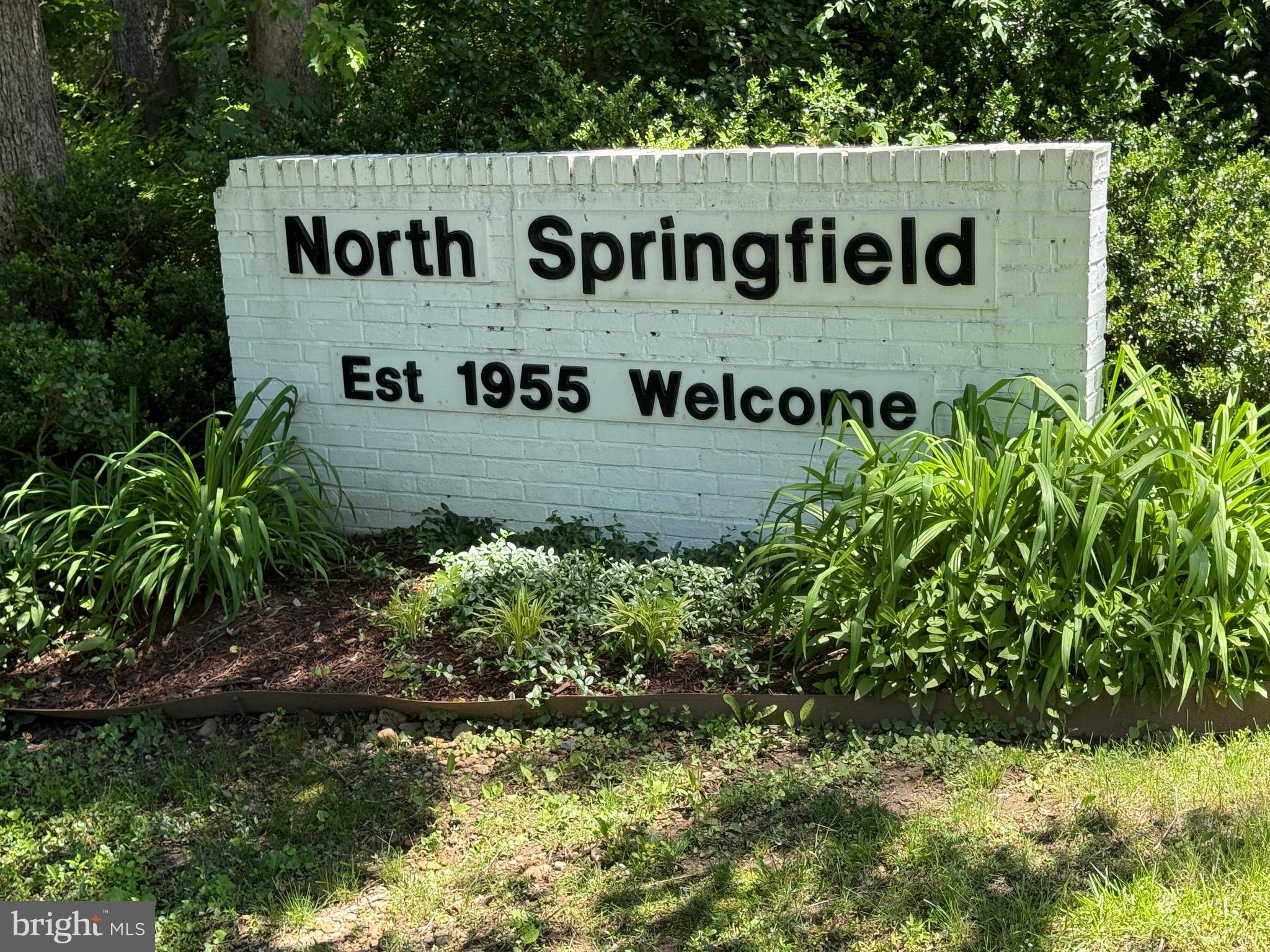 5608 Heming Avenue Springfield, VA 22151 - Photo 25 of 26 a sign broad in front of flowers
