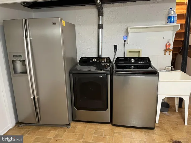 a close view of water heater and washer