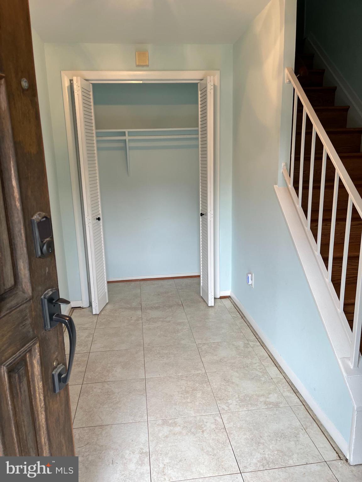 5608 Heming Avenue Springfield, VA 22151 - Photo 9 of 26 a view of an empty room with stairs