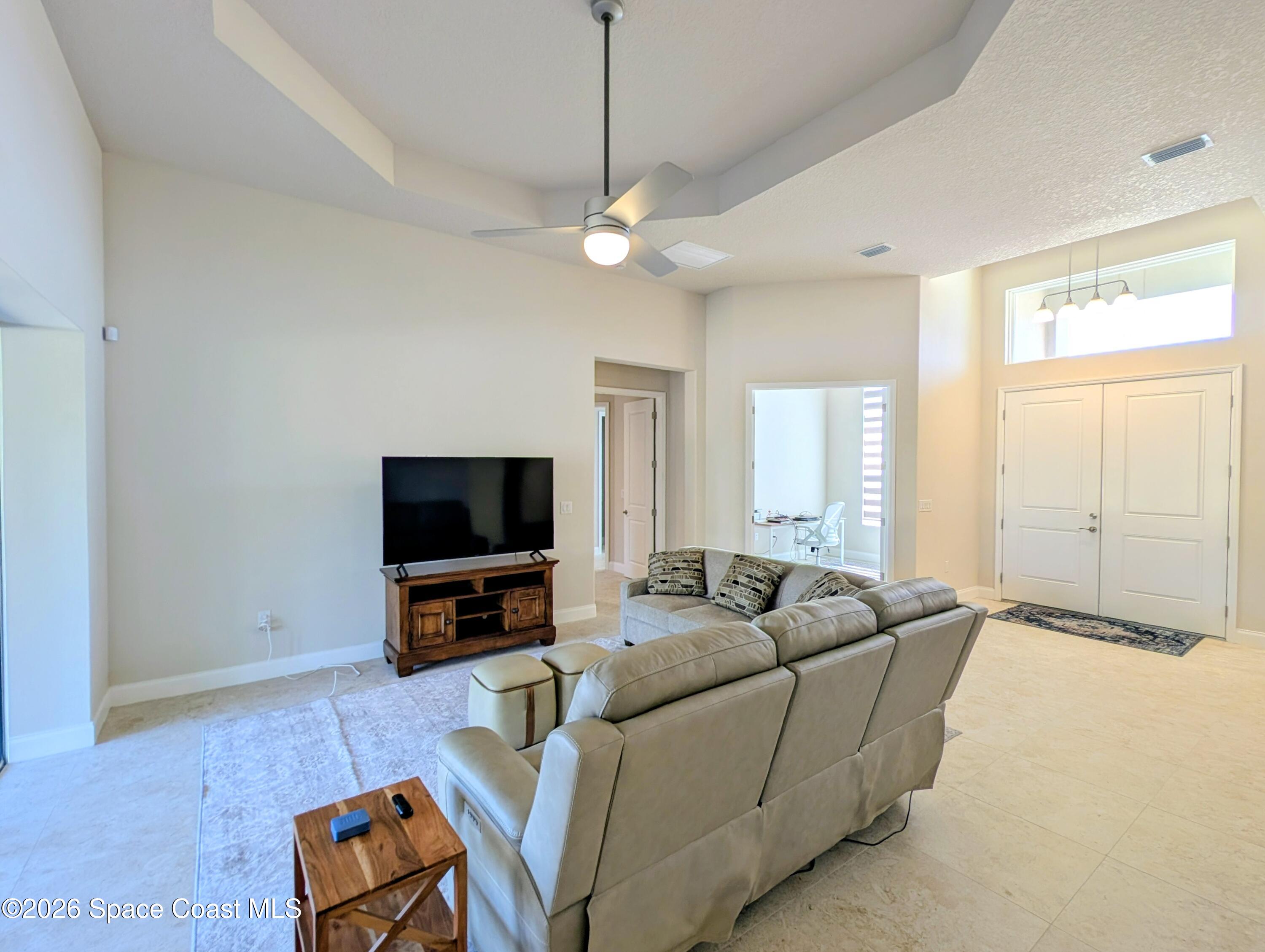 332 Pinto Lane Palm Bay, FL 32909 - Photo 4 of 28 PXL_20260201_173441671~2