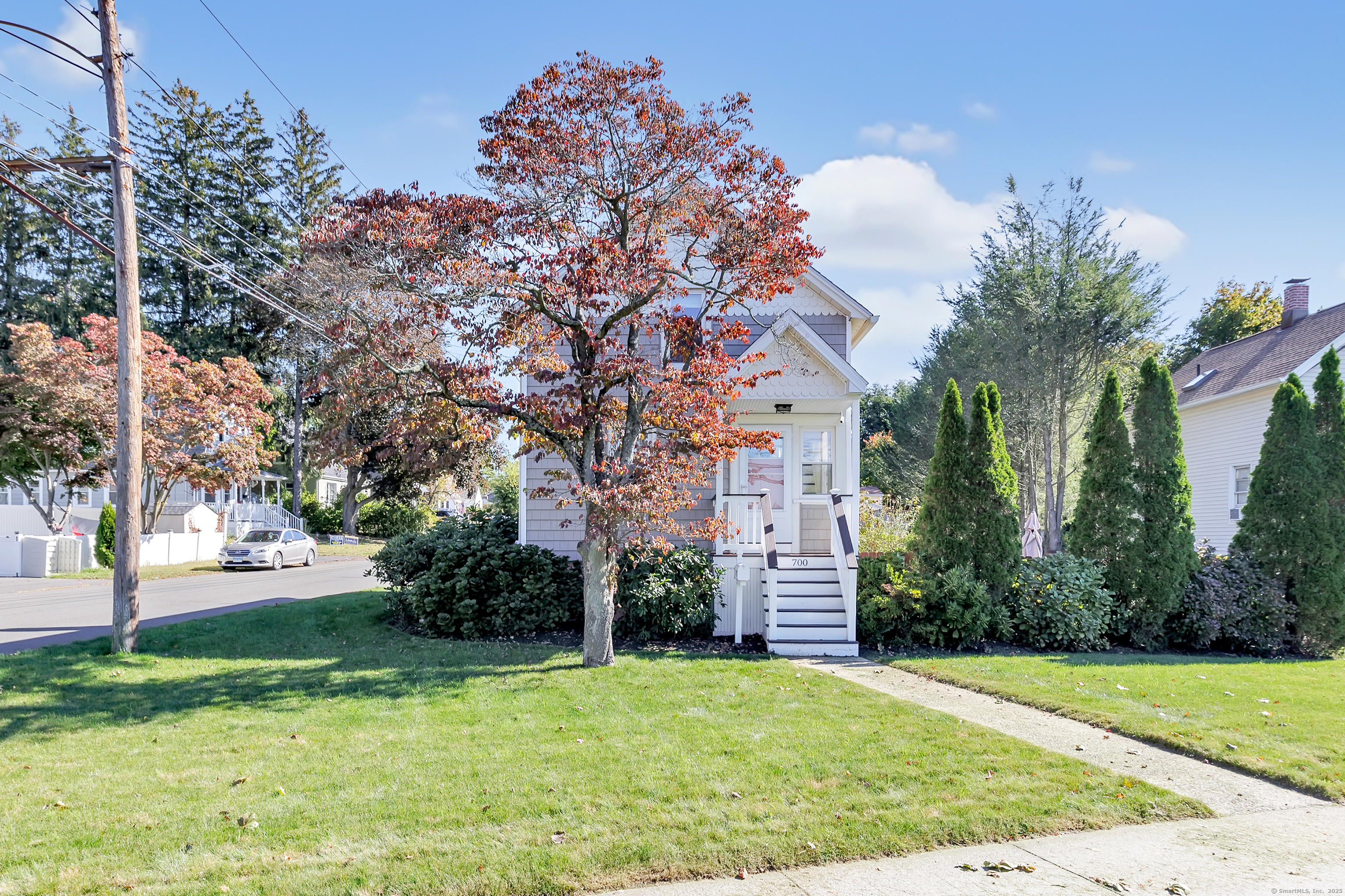 a view of a yard in front of a house