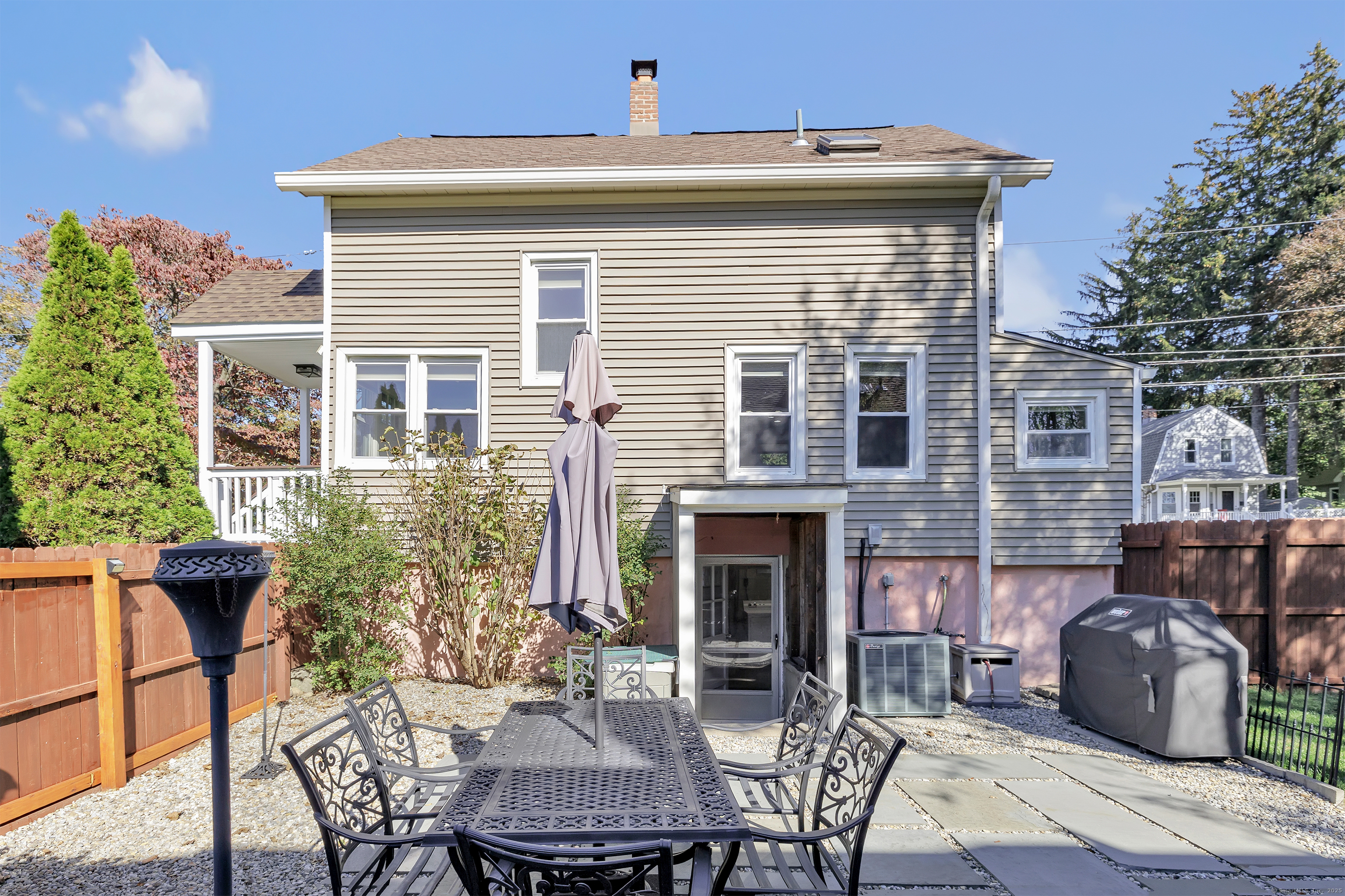700 Huntington Road Stratford, CT 06614 - Photo 11 of 33 a view of a patio with table and chairs and potted plants