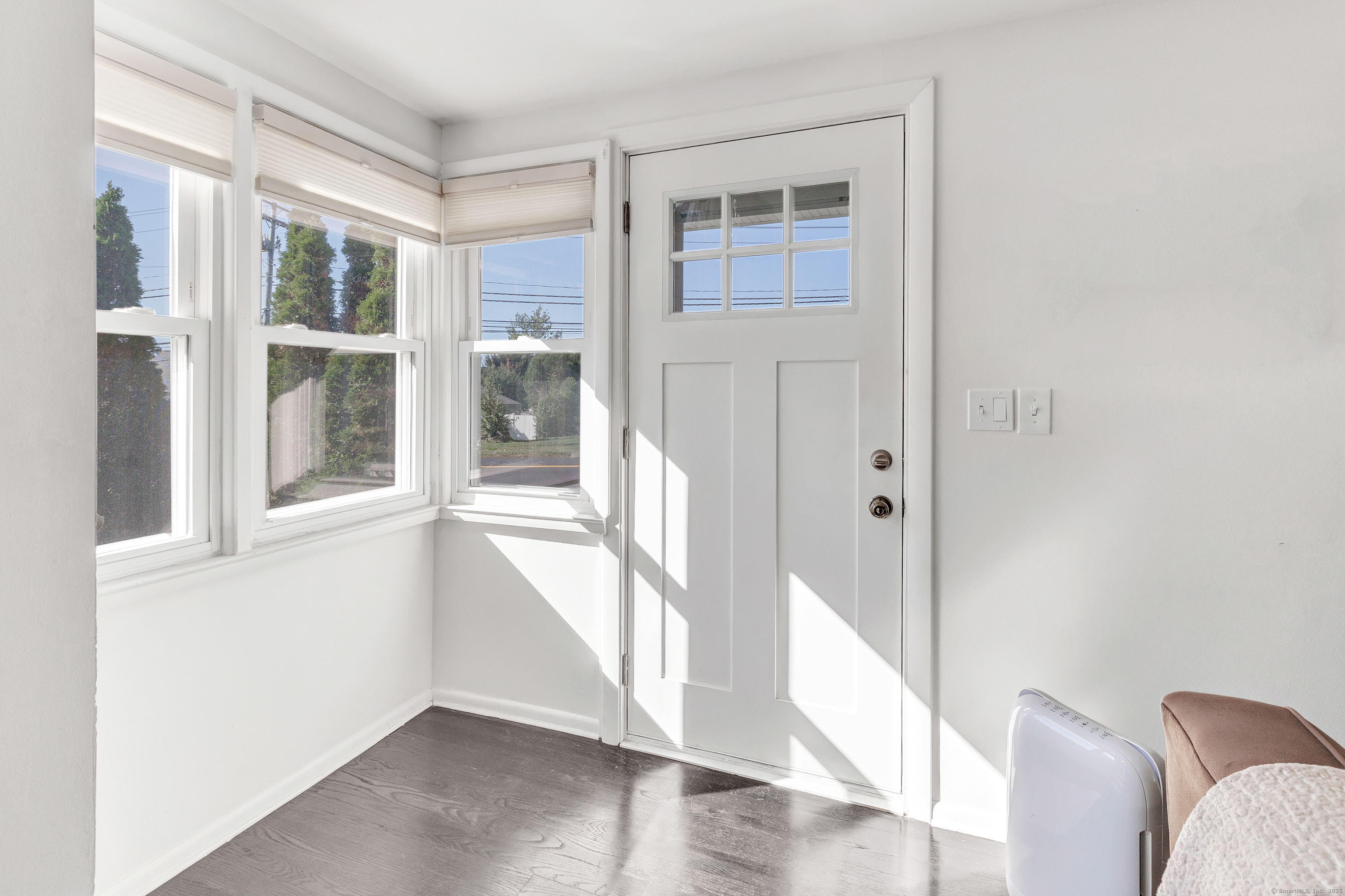 700 Huntington Road Stratford, CT 06614 - Photo 13 of 33 a view of an entryway with wooden floor and door